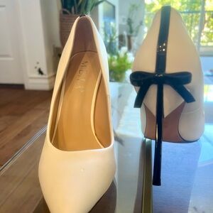 Elegant White Heels with Black Bow